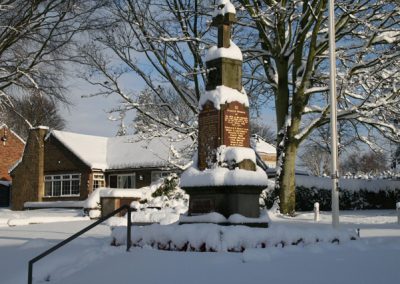 A view of the War Memorial partly covered in snow